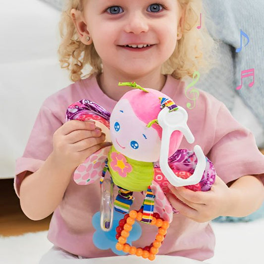 Hochet sensoriel fille souriante