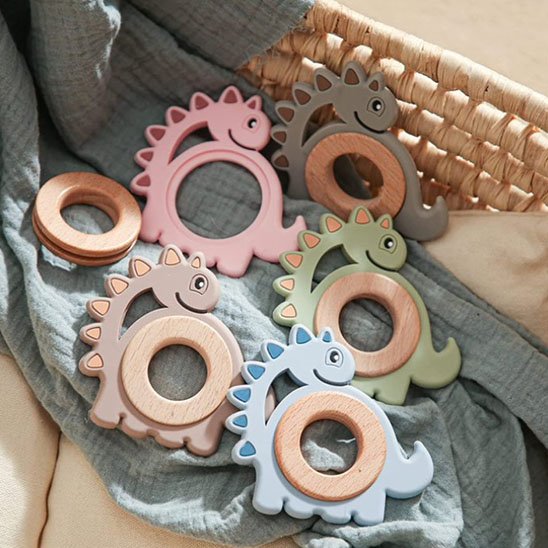 anneau de dentition dinosaure mignon couleurs pales