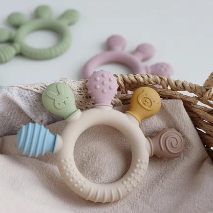 anneau de dentition ergonomique