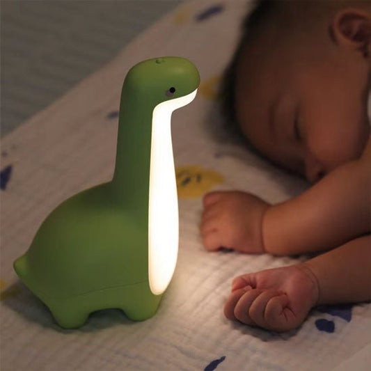 enfant endormie avec veilleuse bébé dinosaure mignonne