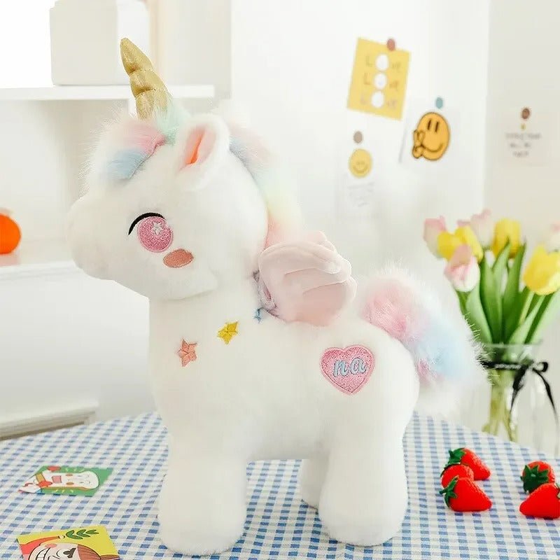 licorne en peluche rose